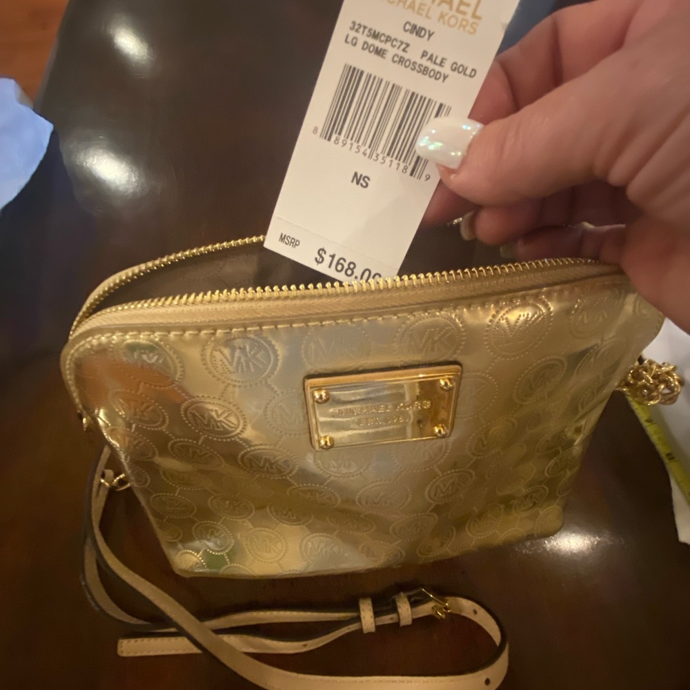 Michael Kora gold crossbody purse
